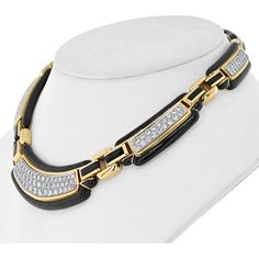 Cherish the union of timeless beauty and contemporary flair in the David Webb Platinum & 18K Yellow Gold Black Enamel Diamond Collar Necklace. This exquisite piece is a testament to the unmatched artistry and meticulous craftsmanship synonymous with David Webb.Picture yourself adorned in luxury as you embrace the captivating allure of this necklace. Composed of seven meticulously crafted plaques, each adorned with round cut diamonds, this necklace is a masterpiece of elegance and sophistication. The diamonds, totaling approximately 9.00 carats, are expertly set to create a mesmerizing play of light and brilliance with every movement.Crafted from platinum and 18K yellow gold, this necklace is not just a piece of jewelry but a statement of refined taste and opulence. Its substantial weight o Luxury White Gold Jewelry With Black Enamel, Luxury Designer Black Enamel Jewelry, Luxury Designer Jewelry With Black Enamel, Luxury Gold Enamel Necklaces, Luxury Black Enamel Necklace, Luxury Elegant Black Enamel Jewelry, Luxury Statement Jewelry With Black Enamel, Luxury Enamel Statement Necklace, Luxury Elegant Necklace With Black Enamel