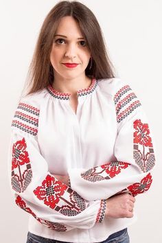 Ukrainian Embroidered Blouse (Vyshyvanka) Ukrainian Embroidered Blouses for women (vyshyvankas) with traditional embroidery sewed as per custom measurements of the client. Material of dress is homespun fabric, embroidery is made by acrylic threads. As we are sewing these blouses by own we can sew any size. So it can be XS - XL1.  Terms of Sale  While making order in the box after making payment or in separate private message please give information:  1) model of dress You would like to buy: whit Traditional Cotton Tops With Embroidered Cuffs, Traditional Cotton Blouse With Embroidered Cuffs, Folk Style Long Sleeve Top With Embroidered Cuffs, Traditional Long Sleeve Blouse With Embroidered Cuffs, Traditional Summer Tops With Embroidered Cuffs, Folk Blouse With Motif And Long Sleeves, Folk Style Long Sleeve Blouse With Motif, Traditional Long Sleeve Embroidered Top With Embroidered Cuffs, Traditional Long Sleeve Top With Embroidered Cuffs