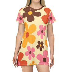 Get ready to channel your inner flower child with our Mid Mod Daisy Flower Power T-Shirt Dress! This retro-inspired dress screams 70s disco party vibes and is the perfect choice for all your groovy gatherings. With its vibrant daisy pattern and mod style, you'll be the life of the party. Don't forget to spread the love by gifting this dress to your fellow hippie enthusiasts. Get your summer groove on and rock this funky dress! Key Features 100% Polyester: This extremely strong and durable synthetic fabric retains its shape and dries quickly White thread color Light fabric (6.0 oz/yd² (170 g/m Tagless Runs true to size Side seams: Located along the sides, they help hold the garment's shape longer and give it structural support Self fabric binding: Bindings are made from the same fabric as t Retro Print Short Sleeve Dresses For Spring, Spring Retro Print Short Sleeve Dresses, Spring Retro Print Dresses With Short Sleeves, Yellow Dress With Retro Print For Spring, Spring Yellow Dress With Crew Neck, Yellow Crew Neck Dress For Spring, Hippie Fitted Short Sleeve Dress, Groovy Multicolor Spring Dress, Mod Short Sleeve Summer Dresses