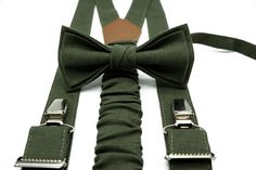 Army Green Linen Bow Tie and Suspender Set: A Timeless Choice for Groomsmen and Young Gentlemen Add a touch of natural elegance to your formal wear with our army green linen bow tie and suspender set. This classic combination is perfect for weddings and special occasions, offering a stylish and cohesive look for men and boys alike. Details Material - 100% Linen. Pre-Tied Bow Tie. Handmade - Made To Order. Packaged in a gift box. ✦Pre-Tied Bow Tie Sizes: Adult Bow tie - (17 years - up to adult`s) Green Suspenders, Toddler Bow Ties, Baby Bowtie, Suspenders Set, Beige Pants, Kids Bow Ties, Toddler Bows, Pre Tied Bow Tie, Suspenders