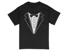 Elevate your casual wardrobe with this stylish tuxedo graphic t-shirt. Boasting a sharp black and white tuxedo print, this shirt seamlessly blends the comfort of a tee with the classic sophistication of formal attire. Perfect for parties, casual events, or as a unique gift for the well-dressed man in your life. Made with high-quality material, it ensures both comfort and style. Diy Tuxedo Shirt, Black Formal Shirt With Graphic Print, Black Cotton T-shirt For Party, Elegant Formal Tops With Graphic Print, Elegant Tops With Graphic Print For Formal Occasions, Elegant Crew Neck Top With Graphic Print, Elegant Black Top With Graphic Print, Black Short Sleeve T-shirt For Party, Black Graphic Tee For Party