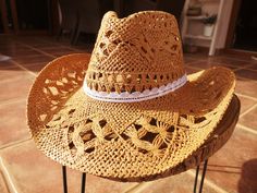 "Hats for women, bohemian hats, boho hats, cowgirl hats, straw cowboy hat, stetson hats, cowboy hats, straw hat, sun hat, buy online cowboy hats for women, sun hats, beach hats, custom hats & personalized hats for women. Jewelry & fashion accessories, original designs by kekugi. Best gift ideas !! This Stylish cowboy hat is accented with a crochet white ribbon This hat is soft yet supple, making it light to wear yet durable to last for years. These womens hats are perfect for any summer Cowgirl Straw Hat, Cowboy Hats For Women, Hats Cowgirl, Boho Hats, Hats Cowboy, Bohemian Hats, Hats Beach, Bohemian Cowgirl, Stetson Hats