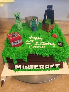 a birthday cake made to look like minecraft