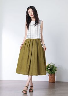 Cool and comfortable for hot summer days, this linen skirt is elegant and stylish.  It is a wonderful wardrobe staple that's a timeless classic you'll wear again and again. All our items are Tailored and Handmade and Made to Order ,I can make Any Size . I design new styles every week, please collect my store. I believe that you will meet your favorite styles. ★★FEATURES 100% Linen skirt Two side pockets Side button closure Linen skirt High waist skirt Midi skirt A-Line skirt Simple Linen skirt P Casual A-line Pleated Summer Skirt, Casual A-line Pleated Skirt For Summer, Summer Long Maxi Skirt With Pleated Waist, Linen A-line Pleated Skirt, Summer Green Skirt With Pleated Waist, Summer Full Pleated Skirt With Pockets, Pleated Linen Long Skirt, Casual Linen Midi Skirt, Summer Midi-length Pleated Skirt With Pockets