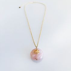 ⚜Item Specifics❀ Stone: Genuine Natural Rose Quartz❀ Flower: 14K Gold Filled Plum Blossom❀ Disc Size: 20 mm❀ Chain: 14K Gold Plated Sterling Silver❀ Length: 16 in. with 1.5 in. Extension Blooming even in the harshest of winters, the plum blossom represents the virtue of endurance and overcoming adversities. In the Divine Land, the plum blossom reminds us that even the most delicate beauty contains strength.A 14K gold plated sterling silver chain holds a genuine natural rose quartz stone accompan Delicate Beauty, Rose Quartz Stone, Plum Blossom, Strawberry Quartz, Golden Globes, Quartz Stone, Flower Necklace, Gold Plated Sterling Silver, Sterling Silver Chains