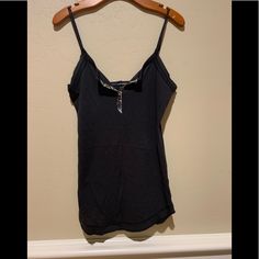 Sexy Navy Spaghetti Adjustable Strap T Shirt. Unique Buttons & Snaps. Never Worn. Pristine Condition. (Box 5) Trendy Tops With Built-in Bra For Loungewear, Trendy Loungewear Tops With Built-in Bra, Casual Camisole Top For Night Out, Trendy Spaghetti Strap Tops For Loungewear, Trendy Spaghetti Strap Loungewear Tops, Trendy Spaghetti Straps Tops For Loungewear, Trendy Loungewear Spaghetti Strap Tops, Cotton Camisole Tops For Night Out, Cotton Spaghetti Strap Camisole For Night Out