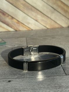 Make this New Retro Style Titanium Steel Men's Bracelet a token of your love, appreciation and friendship. Unique and eye-catching, this bracelet is a great gift for anniversaries, birthdays, and any other special occasion. Add extra meaning to your gift by personalizing it with engraving. Delight your friends, family or loved one with a custom touch that is sure to create lasting memories. Length: 8 1/2 in.  Width 0.5in. **No refunds for customized items unless the order was damaged in shipping or has an error. **We do not refund shipping charges or pay for return shipping. Black Engraved Bracelets For Everyday, Modern Black Jewelry For Friendship, Black Stainless Steel Jewelry For Everyday Use, Modern Black Leather Bracelet For Gift, Black Jewelry Bracelet Strap For Everyday Use, Everyday Black Stainless Steel Jewelry, Black Engraved Bracelets For Friendship, Black Engraved Leather Bracelet For Everyday, Classic Black Leather Bracelet For Gift