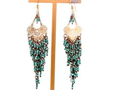 Royalty - Etsy Elegant Turquoise Beaded Earrings With Gold Beads, Blue Gold Beaded Drop Earrings, Blue Metal Beaded Earrings With Colorful Beads, Gold Chandelier Earrings With Colorful Beads For Party, Blue Beaded Metal Earrings, Bohemian Blue Earrings With Gold Beads, Blue Metal Beaded Earrings, Turquoise Earrings With Gold Beads, Blue Earrings With Colorful Metal Beads