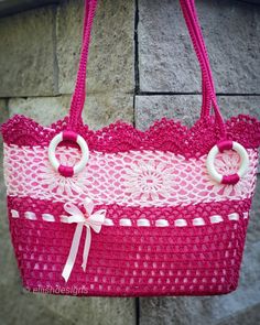 This beautiful crochet made handbag/ shoulder bag is just perfect for everyday use. It is made out of cotton and has been covered with hardening material which will get softer with time but keeping the durability. The inside cover is a cotton and satin fabric, which gives the bag some extra durability and classy touch. Measurements: Handle lenght: 33 cm/ 12.99 inches Bag width: 38 cm/ 14.96 inches Bag length: 26 cm/ 10.23 inches I hope you will enjoy this bag as much as I've enjoyed creating it Pink Square Crochet Bag For The Beach, Pink Square Crochet Bag For Beach, Pink Square Crochet Beach Bag, Pink Crochet Square Shoulder Bag, Pink Square Crochet Shoulder Bag, Pink Crochet Beach Bag For Everyday Use, Pink Crochet Rectangular Beach Bag, Rectangular Pink Crochet Beach Bag, Pink Crochet Tote Bag With Handles