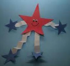 a red, white and blue paper star with a smiley face