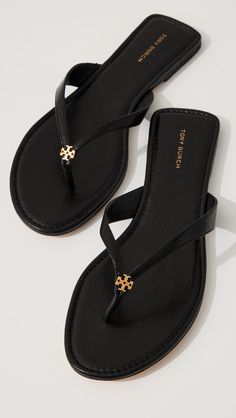 Discover the latest apparel, activewear, shoes & accessories from established and emerging designers. Enjoy free two-day shipping and free returns. Miller Sandals Tory Burch, Tory Burch Flip Flops, Soft Sandals, Miller Sandal, Flip Flops Style, Black Flip Flops, Tory Burch Sandals, Logo Emblem, Leather Flip Flops