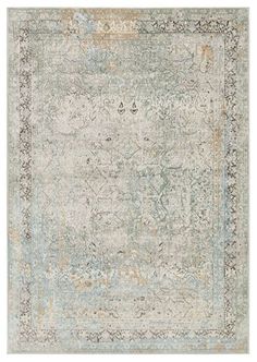 an area rug with blue, beige and green colors on the bottom half of it