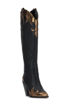 Metallic appliqués up the glam factor of an over-the-knee Western boot that takes your look to the next level. 3 1/2" heel 14 1/2" shaft; 15 1/4" calf circumference Inset side-zip closure Synthetic upper and lining/rubber sole Imported Cowgirl Cocktail Attire, Dresses To Wear With Cowboy Boots, Western Glam Outfit, Western Formal, Tall Cowgirl Boots, Best Cowboy Boots, Womens Cowboy Boots, Knee High Western Boots, Western Glam