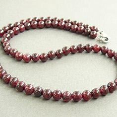 Garnet Necklace Garnet Beaded Necklace January Birthstone | Etsy Red Garnet Beaded Necklaces With Round Beads, Red Garnet Round Bead Necklaces, Red Garnet Beaded Necklaces, Burgundy Beaded Necklaces With Round Beads As Gift, Red Choker Necklace, Simple Gold Necklace, Rosary Style Necklace, Red Choker, Bridal Party Jewelry