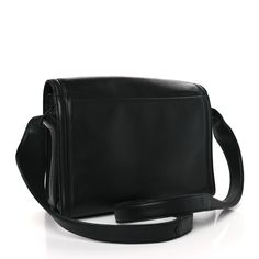 This is an authentic CHANEL Lambskin CC Shoulder Bag in Black. This stylish shoulder bag is crafted of luxuriously soft lambskin leather. The bag features a waist length leather shoulder strap and a facing flap with a quilted Chanel CC logo and a long black leather. The flap opens to a spacious black fabric interior. Stylish Shoulder Bag, Shoulder Bag Black, Cc Logo, Long Black, Waist Length, Lambskin Leather, Black Fabric, Shoulder Strap, Black Leather