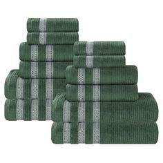 six green towels stacked on top of each other