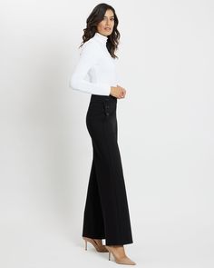 Meet Maeve! A wide-leg, full length knit pant with an elastic waistband and button detail that sits on the hip. Sleek and flattering on all body types. Your new wardrobe must have! In our Jude Ponte - softly structured knit fabric with a comfortable amount of stretch. Details & Fit: Pull-on wide-leg full length pant. 31 1/2" inseam. Model is 5’10 and wearing a size Small. Made in the U.S.A. Color - Black. Fabric & Care: Rayon/Nylon/Spandex. Dry clean recommended. We are here to help! Please reac Elegant Full-length Bottoms With Button Closure, Elegant Full Length Bottoms With Button Closure, Chic Wide Leg Pants With Button Cuffs, Wide Leg Pants With Buttons For Work, Chic Wide Leg Straight Pants With Button Cuffs, Chic Formal Wide Leg Pants With Button Closure, Business Casual Wide Leg Bottoms With Button Cuffs, Elegant Wide Leg Bottoms With Button Cuffs, Classic Wide Leg Dress Pants With Buttons