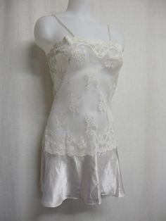 "Short White Lace and Satin Nightgown Unbelievably adorable! Sheer Baby doll /white nightie! Tons of lace with a satin flouncy skirt This is sassy! (Like You!) Small 36\" bodice 40\" Hip 32\" length Easy care poly GREAT for brides! https://www.etsy.com/shop/BelindasStyleShop" Sheer Lace Slip Dress For Sleep, Fitted Delicate Lace Nightgown For Sleep, White Nightgown With Lace Trim And Spaghetti Straps, Delicate Lace Slip Dress For Sleep, White Spaghetti Strap Nightgown With Lace Trim, White Fitted Slip Dress For Night, Cream Lace Wedding Nightgown, Coquette Slip Dress With Lace Trim For Sleep, Wedding Cream Lace Nightgown