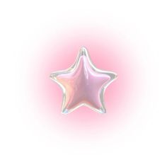 a pink and white star balloon floating in the air on a light pink back ground