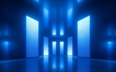 an empty room with blue light coming through the doors