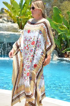 Beautiful mixed floral print on a white background bordered in beige and dark brown.  Non-sheer cotton polyester fabric.  Great for pool or beach or everyday lounging. On size.  Fits small to X-large.  51 inches in width and 51 inches in length. Beach Dress Plus Size, Silk Beach Dress, Plus Size Caftan, Lounge Wear Summer, Batik Clothing, Long Kaftan Dress, Beach Caftan, White Silk Dress, Abstract Print Dress