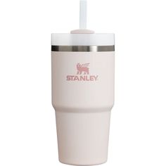 a white tumbler cup with a straw sticking out of it's lid and the word stanley on the side