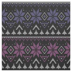 a knitted pattern with different colors and shapes on black fabric, suitable to be used as a background or wallpaper