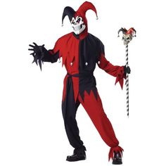 a man in a red and black clown costume holding a stick with his hands out