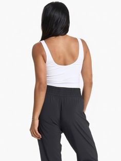 Whether you toss it on to go to the yoga studio or to run your summer errands  the women's Vuori Daily Crop tank top is an easy-to-wear everyday staple with a comfortable built-in bra. Op Logo, Tank Top White, Crop Tank Top, Running Workouts, Rei Co-op, Yoga Studio, Body Image, White Tank Top, Lining Fabric