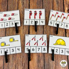 four construction themed placemats with tools on them, and the numbers 1 - 10