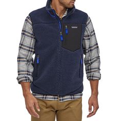 evo.com | Patagonia Vests > The Patagonia Classic Retro-X | Patagonia Classic Retro-X in Blue Size Small Patagonia Fleece Jacket For Outdoor Fall Activities, Patagonia Sporty Outdoor Fleece Jacket, Patagonia Fleece Jacket With Fleece Lining For Outdoor, Patagonia Fleece Jacket With Pockets For Outdoor Activities, Patagonia Casual Windproof Outerwear, Casual Patagonia Fleece Jacket For Outdoor Activities, Patagonia Casual Outdoor Outerwear, Navy Casual Fleece Jacket For Outdoor Activities, Casual Nylon Fleece Jacket With Pockets