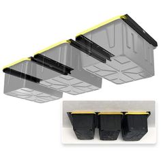 three black and yellow storage bins hanging from the ceiling, with one in between them