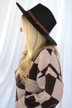 Details: ﻿Black wide brim panama hat with brown strap! Material: 65% COTTON. 35% POLYESTER. Black Adjustable Panama Hat With Flat Crown, Chic Black Fedora With Flat Crown, Chic Brimmed Panama Hat For Fall, Chic Adjustable Brown Fedora, Chic Fedora Panama Hat For Fall, Black Fedora With Flat Crown For Fall, Chic Brown Brimmed Boater Hat, Black Panama Hat With Short Brim For Rodeo, Black Short Brim Panama Hat For Rodeo