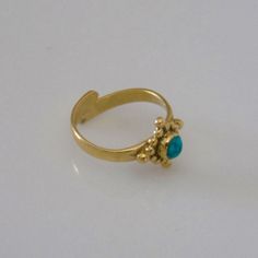 A super cute and adjustable brass toe ring set with gemstone in the center. Adjustable Brass Toe Ring, Adjustable Gemstone Toe Ring, Brass Stackable Toe Rings, Handmade Adjustable Open Birthstone Ring, Unique Adjustable Birthstone Ring, Adjustable Tiny Toe Rings, Adjustable Brass Crystal Ring With Open Design, Adjustable Brass Flower Ring, Adjustable Birthstone Midi Toe Rings