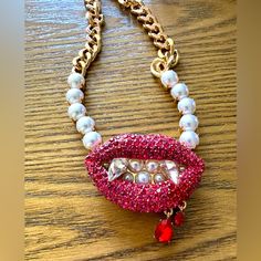 Brand New With Tag, This Betsey Johnson Necklace Is Perfect For The Halloween Season And Beyond For Any Gothic Glam Vampire Lover. Featuring Pink Rhinestone Simulated Gemstone Lips And Fangs, Red Gemstone Blood Drops, Faux Pearls And Gold Tone Chunky Curb Link Chain. 16” With 3” Extender And Lobster Clasp. Ships Next Day M-F Blood Pearl Necklace Design, Glam Vampire, Vampire Lips, Gothic Glam, Betsey Johnson Necklace, Halloween Necklace, Pearl Necklace Designs, Jewelry Accessories Ideas, Girly Accessories