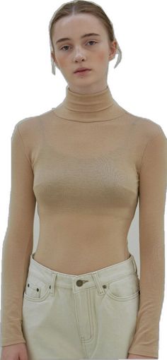 Fine Knit Beige Turtleneck For Fall, Fitted Beige Turtleneck For Winter, Chic Fitted Solid Color Turtleneck, Chic Beige High Stretch Top, Chic Fitted Turtleneck In Solid Color, Chic High Stretch Beige Tops, Trendy Beige High Neck Turtleneck, Fitted Beige Plain Top, Fitted Plain Turtleneck Top