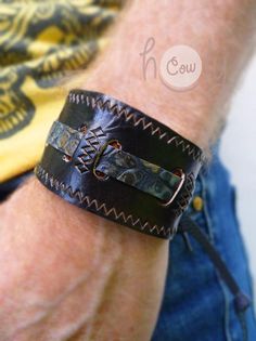 This hippie bracelet is 100% handmade from the finest quality black leather and blue snake print leather. It is beautifully designed with unique carvings. It is closed by tying leather straps together. The strap is adjustable so it fits most wrist sizes. The product is new so I can Bracelets Hippie, Hippie Bracelet, Womens Bracelet, Black Leather Bracelet, Hippie Bracelets, Bracelet Mens, Mens Black Leather, Boho Bracelet, Leather Cuffs Bracelet