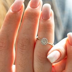 Flower halo ring made in 14k or 18k gold and set with clear, natural, high-quality diamonds. This listing is for WHITE GOLD. You can order other colors from the following links: ● Yellow gold - https://www.etsy.com/listing/1234735117/ ● Rose gold - https://www.etsy.com/listing/1234757601/ �♦ CENTER DIAMOND SPECIFICATIONS ♦ Shape: Round  Carat Weight: 0.30ct Color: I + Clarity: SI + ♦ SIDE DIAMONDS SPECIFICATIONS ♦ Total Carat Weight: 0.09ct Color: G + Clarity: VS + ♦ We work with high-quality dia Flower Halo, Engagement Ring Diamond, Ring Flower, Ring Halo, 18k Gold Ring, Halo Diamond Ring, Small Rings, Ring Diamond, Halo Ring