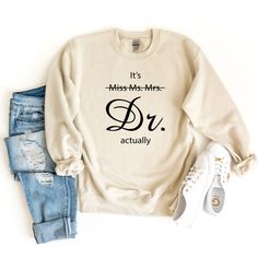 a sweatshirt that says it's miss and mrs, dr actually on the front