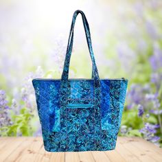 This bag is made in cotton batik fabric. The bag features six divided pockets on the inside, allowing you to separate and categorize your belongings as per your preference. Additionally, there are two pockets on the outside of the bag, one zippered and one slip pocket, providing even more storage options for your convenience.   ❤️This gorgeous Tote bag  It can be a work bag, project bag, laptop bag, gym bag, tote bag, casual shoulder bag, travel bag. Suitable for work, study, travel, shopping, gym, school, collage and more occasion. ❤️ It's practical Chrismas gift for your beloved, friends, family, mother, girlfriend. Perfect for daily use ❤️Features: zipper closure, one zipper at the front two large divided slip pockets inside, and one zippered pocket. Double padded at the bottom to be ex Rectangular Cotton Bag With Cell Phone Pocket, Rectangular Cotton Bags With Cell Phone Pocket, Square Cotton Bags With Pockets, Blue Large Capacity Tote Travel Bag, Blue Quilted Shoulder Bag For Travel, Blue Quilted Shoulder Bag For Daily Use, Blue Quilted Tote Shoulder Bag, Blue Patchwork Travel Shoulder Bag, Chrismas Gifts