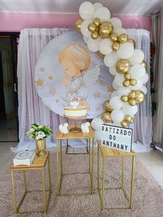 a table with two tables and balloons on it