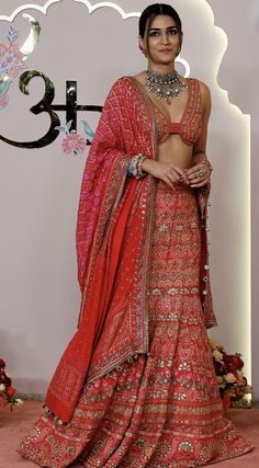 Ambani Wedding Celebrity Outfits, Radhika Merchant Lehenga, Ambani Wedding Outfit, Indian Wedding Outfits Guest For Women, Wedding Guest Indian, Red Indian Wedding Dress, Anant Ambani And Radhika Merchant, Kriti Senon, Ambani Wedding