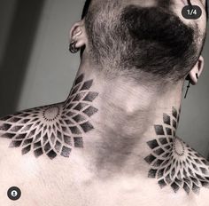 a man with tattoos on his neck and chest