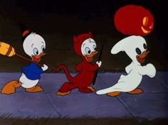 three cartoon characters dressed in halloween costumes