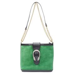 GUCCI Dionysus Kelly green suede black patent trimmed crossbody bucket bag Reference: MELK/A00186 Brand: Gucci Designer: Alessandro Michele Model: 499622 525040 Material: Suede, Patent Leather Color: Green, Black Pattern: Solid Closure: Magnet Lining: Silk Extra Details: Dionysuus buckle. Mixed hardware. Kelly green suede with black patent trimming. Adjustbale shoudler strap. Top zip closure. Blue silk lining Single zip wall compartment, 2 wall pockets. Made in: Italy CONDITION: Condition: Excel Bag Reference, Gucci Crossbody Bag, Gucci Crossbody, Gucci Designer, Gucci Outfits, Gucci Tote, Brown Crossbody, Crossbody Tote Bag, Alessandro Michele