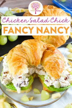 a chicken salad sandwich is cut in half on a plate with grapes around it and the title reads chicken salad chick fancy nancy