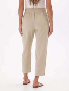 Made from a sustainable blend of Lyocell and Linen, the Winnie Woven Pant features a relaxed fit and elastic waistband. Solid Color Viscose Bottoms With Elastic Waistband, Solid Viscose Bottoms With Elastic Waistband, Versatile Relaxed Fit Viscose Bottoms, Relaxed Fit Viscose Bottoms, Effortless Ankle-length Pants With Elastic Waistband, Versatile Relaxed Fit Bottoms For Daywear, Effortless Daywear Bottoms With Elastic Waistband, Effortless Solid Bottoms With Elastic Waistband, Effortless Bottoms With Elastic Waistband For Daywear