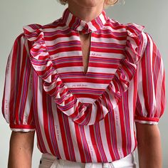 "Vintage 1980s Jac Dale Paris short sleeved Georgette ruffle blouse in a vibrant red, white, blue and green striped print.  It has a single covered button for closure at the front of the neckline and one button on each sleeve cuff. The fabric is 100% polyester, gauzy and slightly sheer. Would best fit size XS or Small - please see measurements below. Model is a size 2 and 5'8 with 30C bust for reference.  Condition: Very good vintage condition  Measurements (measured seam to seam lying flat - double for bust, waist, hem): Shoulders seam to seam: 14.5\" Bust/Armpit to Armpit: 18\" Length: 24\" Sleeve length: 11\" If you would like more information or photos please don't hesitate to ask! Please read our policies and FAQs before purchasing.  Follow iON Vintage on Instagram: @ionvintage Thank Pintuck Shirt, Ruffle Neck Blouse, Style Kawaii, Kawaii Style, Vest Pattern, La Fashion, Collar Top, Sleeve Cuff, Womens Blouses