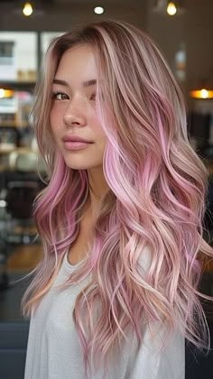 25 Heartfelt Hairstyles for Your Perfect Valentine's Day Different Color Hair Ideas Ombre, Blond To Pink Hair, Pastel Purple Pink Hair, Pink Hair For October, Hint Of Color Hair, Pink Blonde Hair Highlights, Rose Gold Blonde Hair Highlights, Balayage With Pink Peekaboos, Dyed Hair For Dirty Blonde