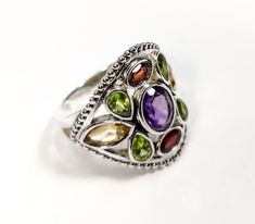 This ring is a piece of art! The personal attention to detail makes this one-of-a-kind .925 sterling silver multi-stone ring from SS EXPORTS a true work of art.✨  Show her that you can take care of her with this beautiful sterling silver multi-stone ring.💕 We Assure Your Satisfaction With Our High-Quality Jewellery * 925 Sterling Silver * Natural Gemstone * Nickel free * Made in India With Love And High Standards Handmade Multicolor Fine Jewelry Rings, Multicolor Multi-stone Amethyst Ring In Sterling Silver, Multicolor Natural Stone Rings For Anniversary, Anniversary Rings With Multicolor Natural Stones, Multicolor Amethyst Ring In Sterling Silver For Anniversary, Multicolor Amethyst Sterling Silver Ring For Anniversary, Multicolor Natural Stones Sterling Silver Rings, Multicolor Open Ring In Sterling Silver, Multicolor Sterling Silver Open Ring